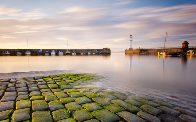 Stone walkway dock lighthouse sunset free wallpaper - medium preview image