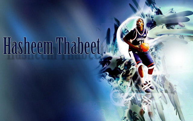Basketball player holding ball air free wallpaper - medium preview image