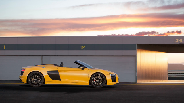Yellow sports car garage sunset free wallpaper - medium preview image