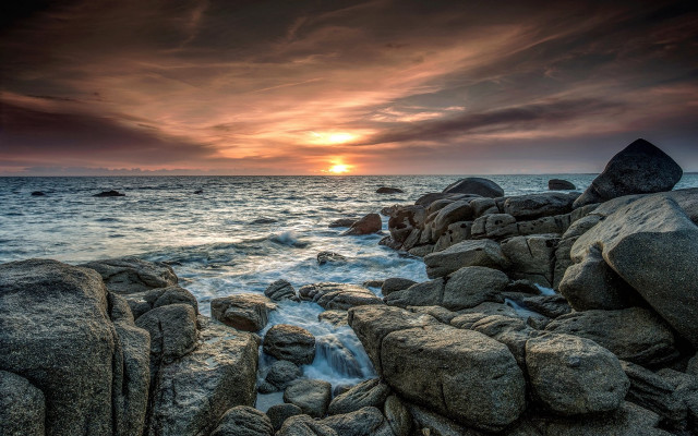 Sunset ocean rocks water cloudy free wallpaper - medium preview image