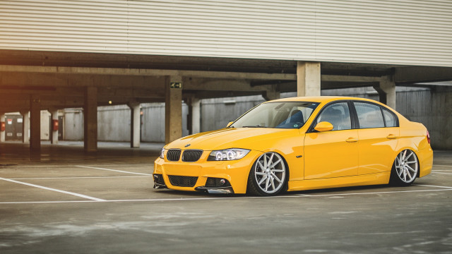 Yellow car parking lot building #2 free wallpaper - medium preview image
