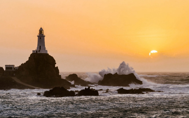 Lighthouse rocky shore waves sunset free wallpaper - medium preview image