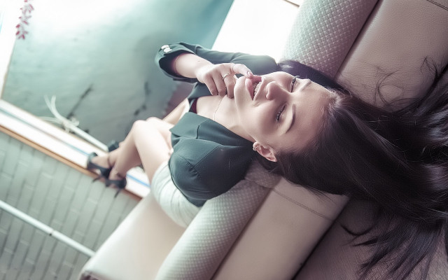 Woman laying couch mirror blurry free wallpaper - medium preview image