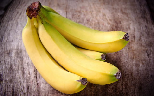 Bananas wooden table peeler knife free wallpaper - medium preview image
