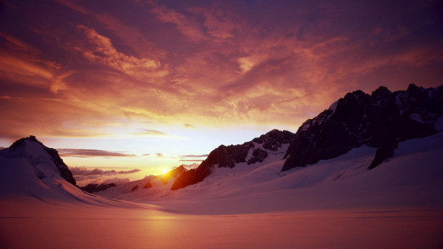 Sunset mountain snow clouds distant free wallpaper - medium preview image