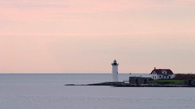 Lighthouse island ocean boat scenery free wallpaper - medium preview image