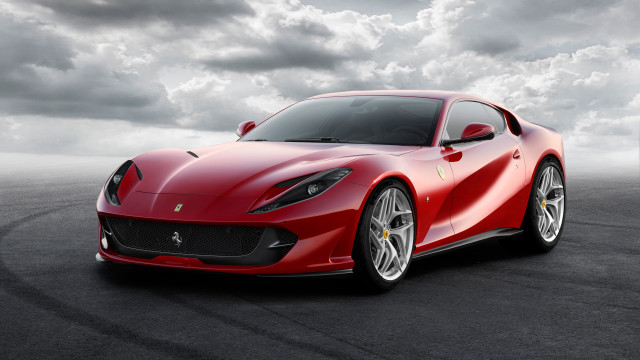 Red sports car cloudy day free wallpaper - medium preview image