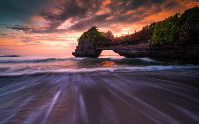 Ocean rock sunset waves person free wallpaper - medium preview image