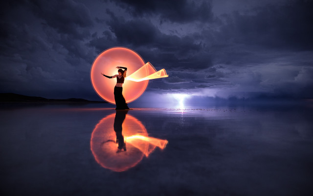 Woman orange object beach night free wallpaper - medium preview image