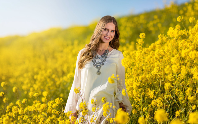 Woman field yellowflowers smiling autumn #2 free wallpaper - medium preview image
