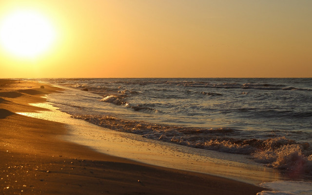 Beach waves sunset person sand free wallpaper - medium preview image