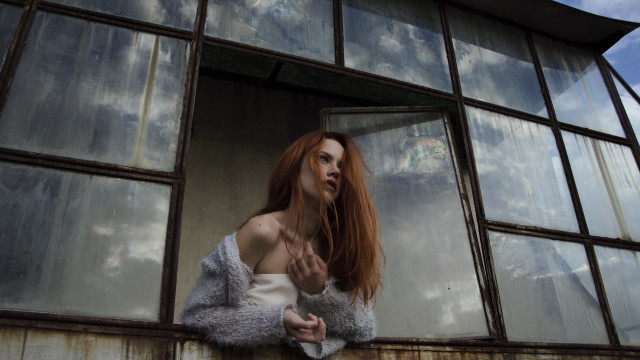 Woman redhair window sky clouds free wallpaper - medium preview image