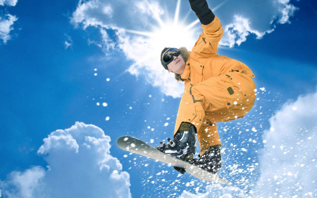 Snowboarder orange jacket trick blue free wallpaper - medium preview image