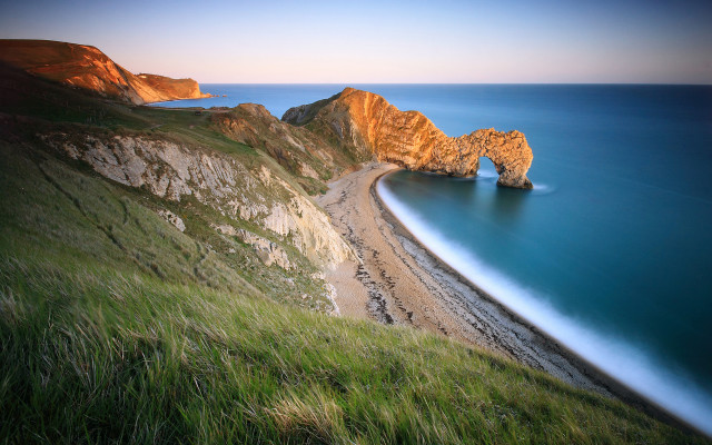 Beach large rock formation tilt free wallpaper - medium preview image