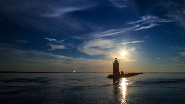 Lighthouse island ocean sunset cityscape free wallpaper - medium preview image