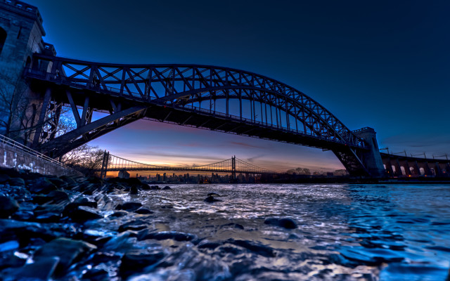 Bridge river sunset rocks cityscape free wallpaper - medium preview image