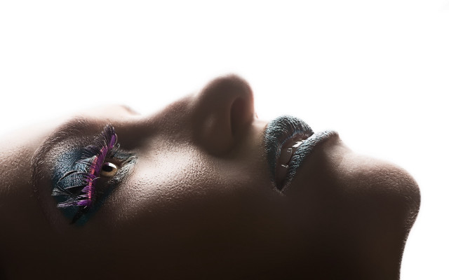 Woman feather face closed tilted free wallpaper - medium preview image