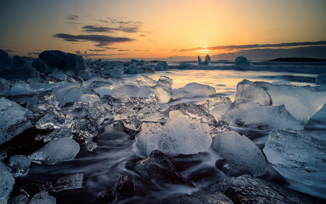 Sunset rocky beach ice waves free wallpaper - medium preview image