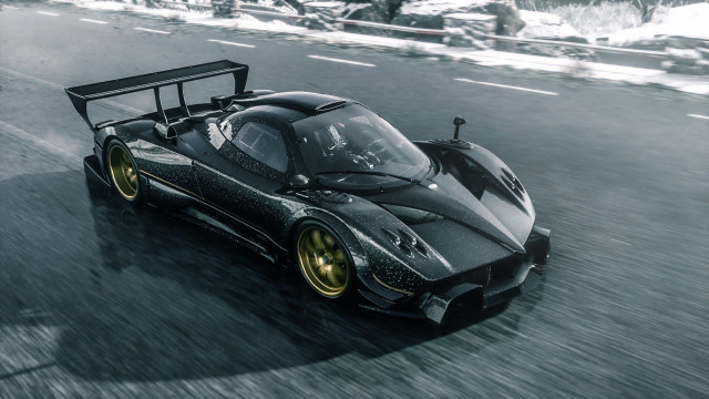 Black race car snow road free wallpaper - medium preview image