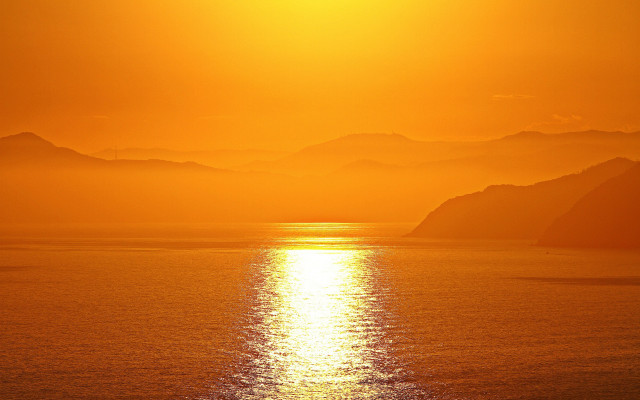 Sunset mountains ocean boat sky free wallpaper - medium preview image