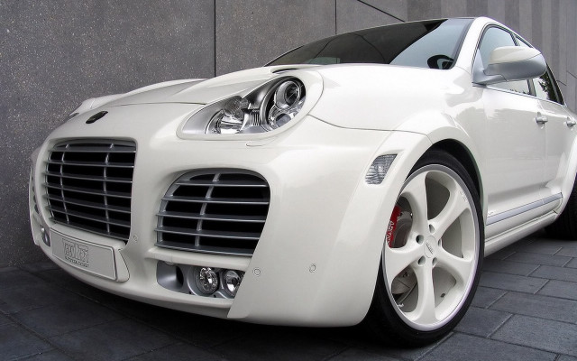 White sports car building night free wallpaper - medium preview image