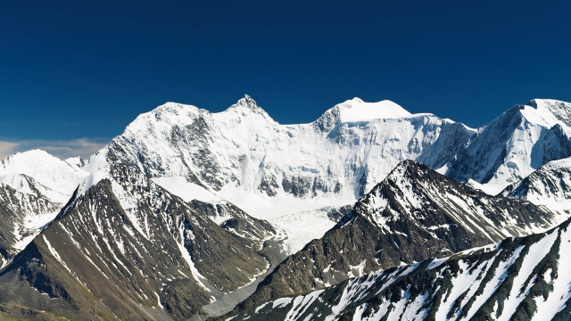 Snowy mountains blue sky arkhip free wallpaper - medium preview image