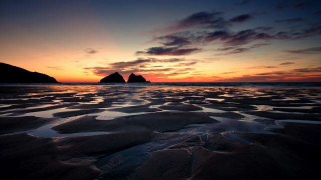 Sunset beach rock formation mountains free wallpaper - medium preview image