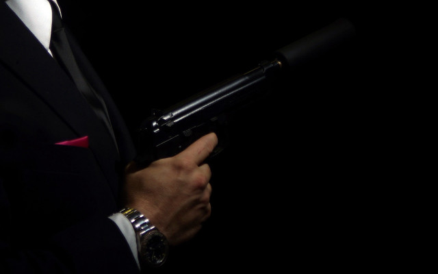 Man suit gun watch redtie free wallpaper - medium preview image