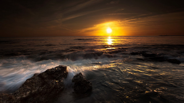 Sunset ocean waves rocks boat #2 free wallpaper - medium preview image