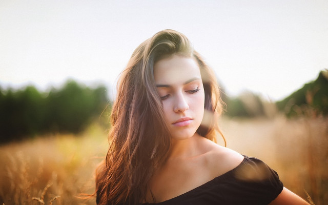 Woman tallgrass cellphone serious portrait free wallpaper - medium preview image