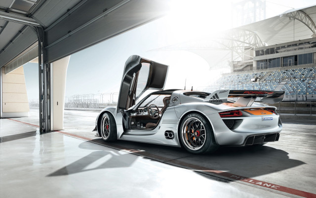 White sports car garage open #3 free wallpaper - medium preview image
