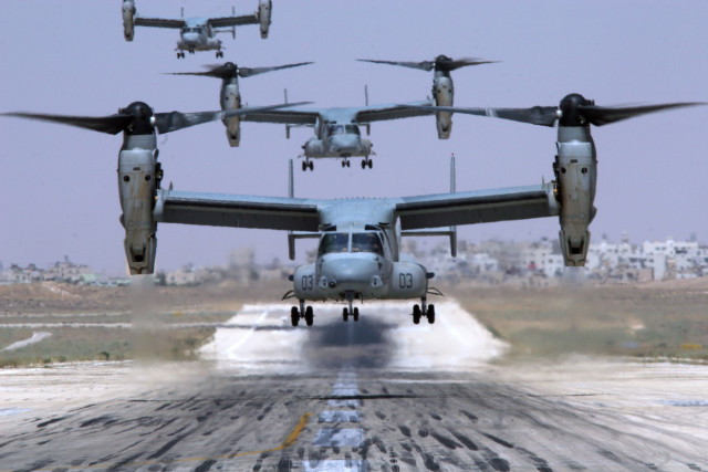 Large airplane flying runway smaller free wallpaper - medium preview image