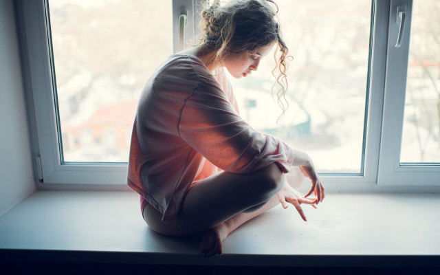 Woman sitting window snow indoor free wallpaper - medium preview image