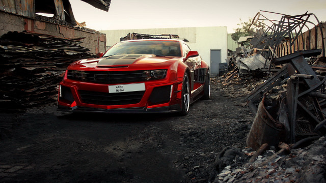 Red car dirty lot building free wallpaper - medium preview image