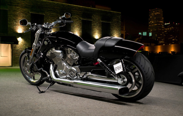 Black motorcycle night building lights free wallpaper - medium preview image