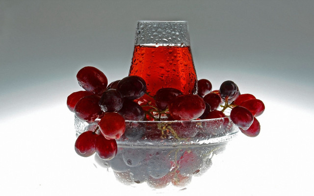 Glass bowl grapes liquid reflection free wallpaper - medium preview image