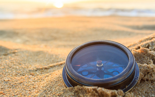 Compass beach sunset sand clouds free wallpaper - medium preview image