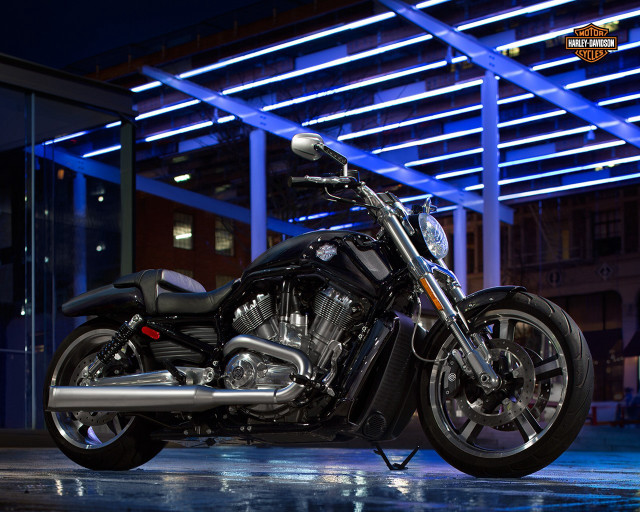 Motorcycle parked building blue light free wallpaper - medium preview image