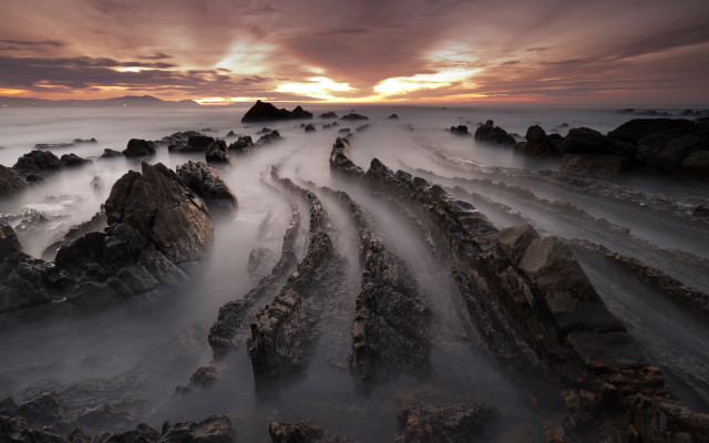Longexposure rockybeach cloudyskies sunset horizon free wallpaper - medium preview image