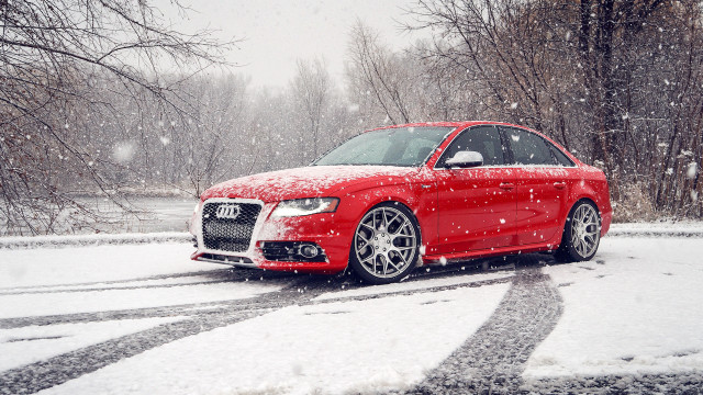Red car snowy road winter free wallpaper for desktop - medium preview image