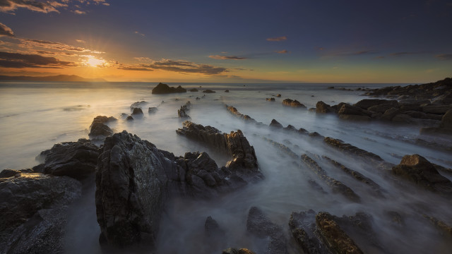 Sunset rocky beach waves horizon free wallpaper - medium preview image