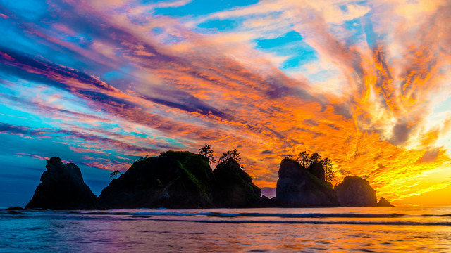 Colorful sunset beach rocks trees free wallpaper - medium preview image