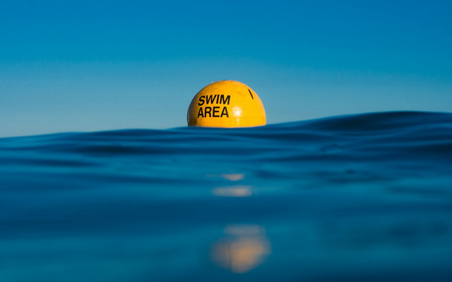 Yellow buoy ocean swim sign free wallpaper - medium preview image