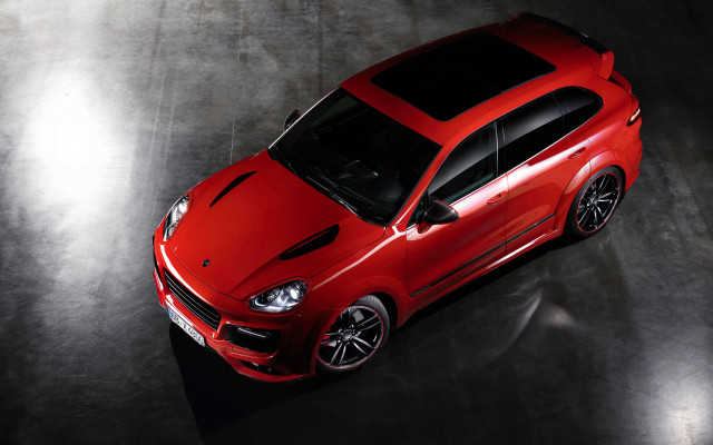 Red car above dark surface free wallpaper - medium preview image