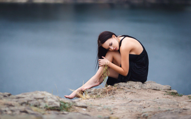 Woman sitting rock water fashion free wallpaper - medium preview image