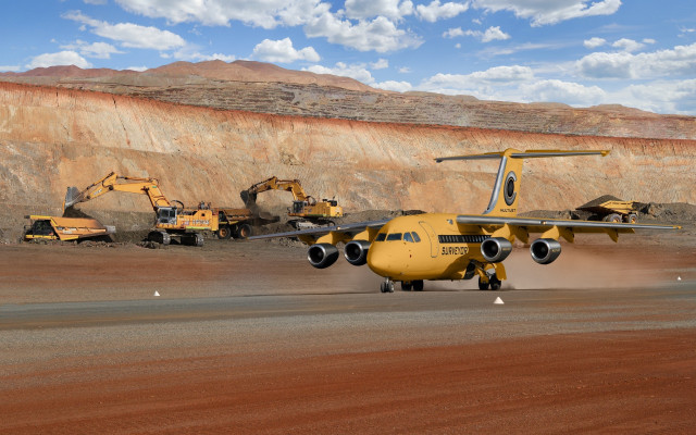 Yellow plane runway mountain rock free wallpaper - medium preview image