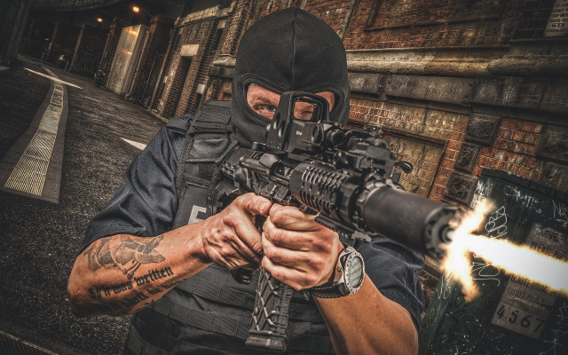 Man mask gun fire city free wallpaper - medium preview image