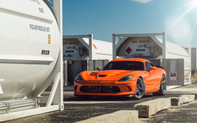 Bright orange sports car parked #3 free wallpaper - medium preview image