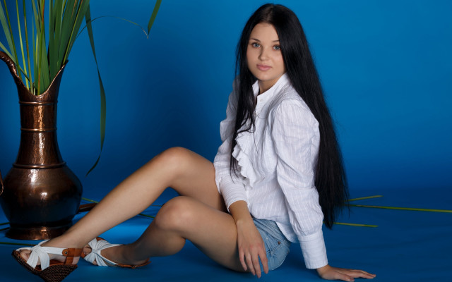 Woman sitting vase plant blue free wallpaper - medium preview image