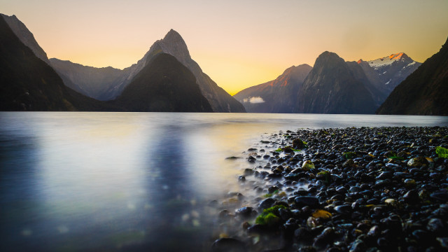 Sunset mountains lake rocks clouds free wallpaper - medium preview image